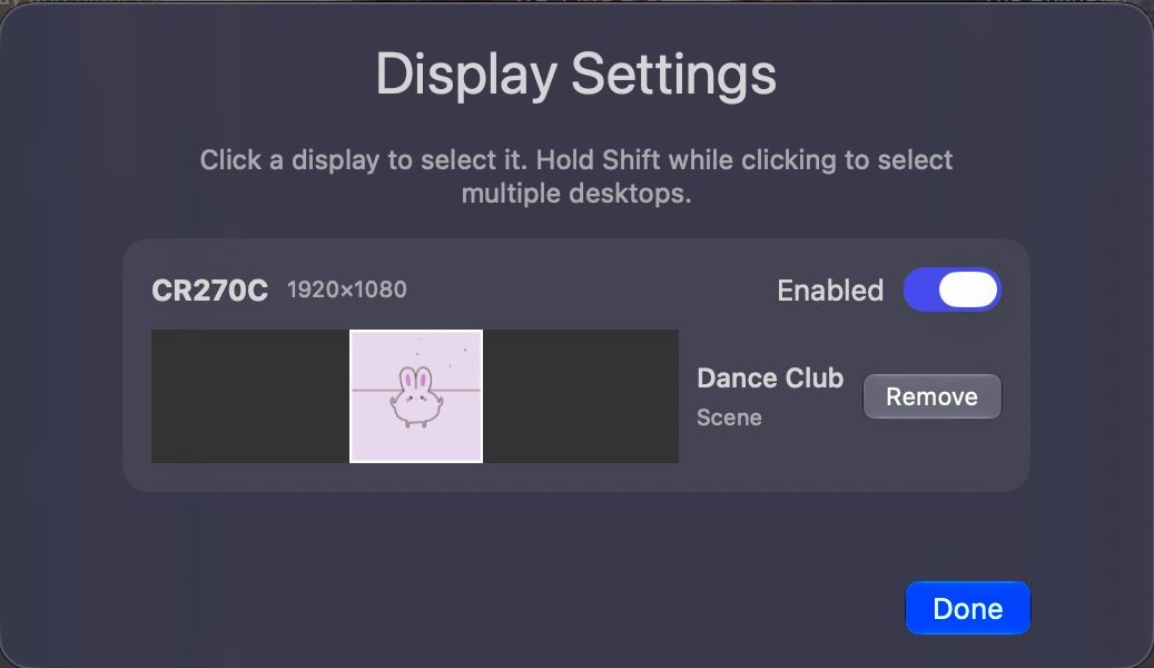The Display Settings sheet showing two connected displays, with the selected display enabled and showing the Dance Club wallpaper.